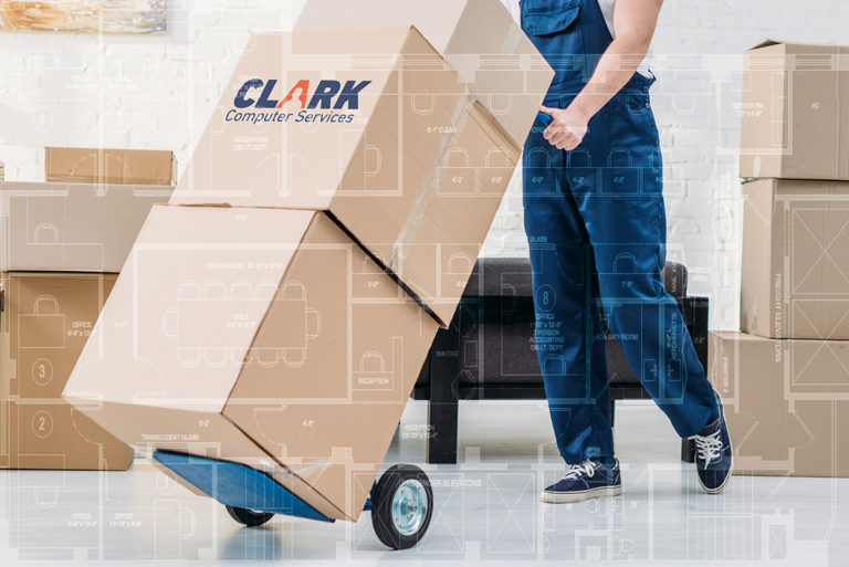 Technology Move Services | Clark Computer Services | Technology Move Services | Clark Computer Services | Technology Move Services Clark Computer Services Technician moving boxes