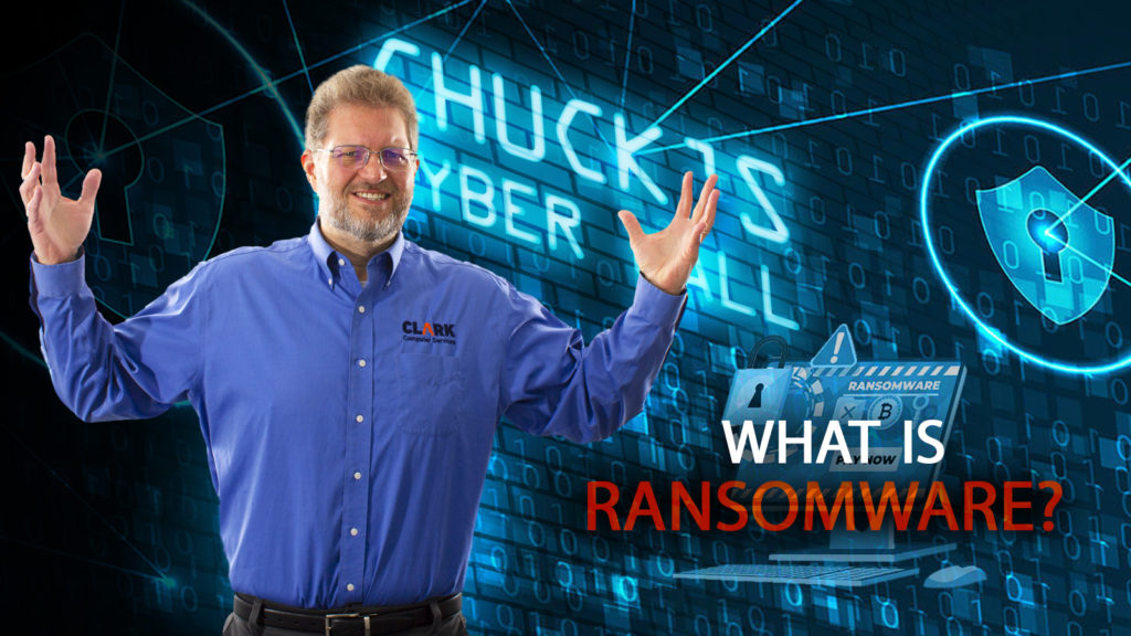 Chuck's Cyber Wall - What is Ransomware? chuck standing in front of logo