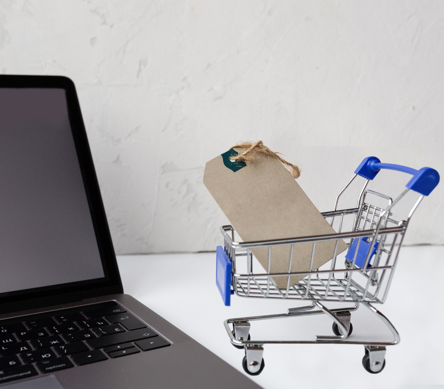 Advice on How To Buy A Laptop | Sydney's Seminar | Advice on How To Buy A Laptop | Sydney's Seminar | How to Buy a Laptop image of laptop next to shopping cart with price tag