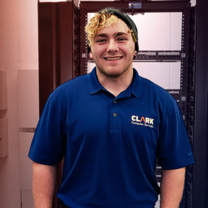 Our Team | Always Responsive, Professional, and Friendly | Our Team | Always Responsive, Professional, and Friendly | Clark Computer Services - Our Team - Jesse in front of a rack