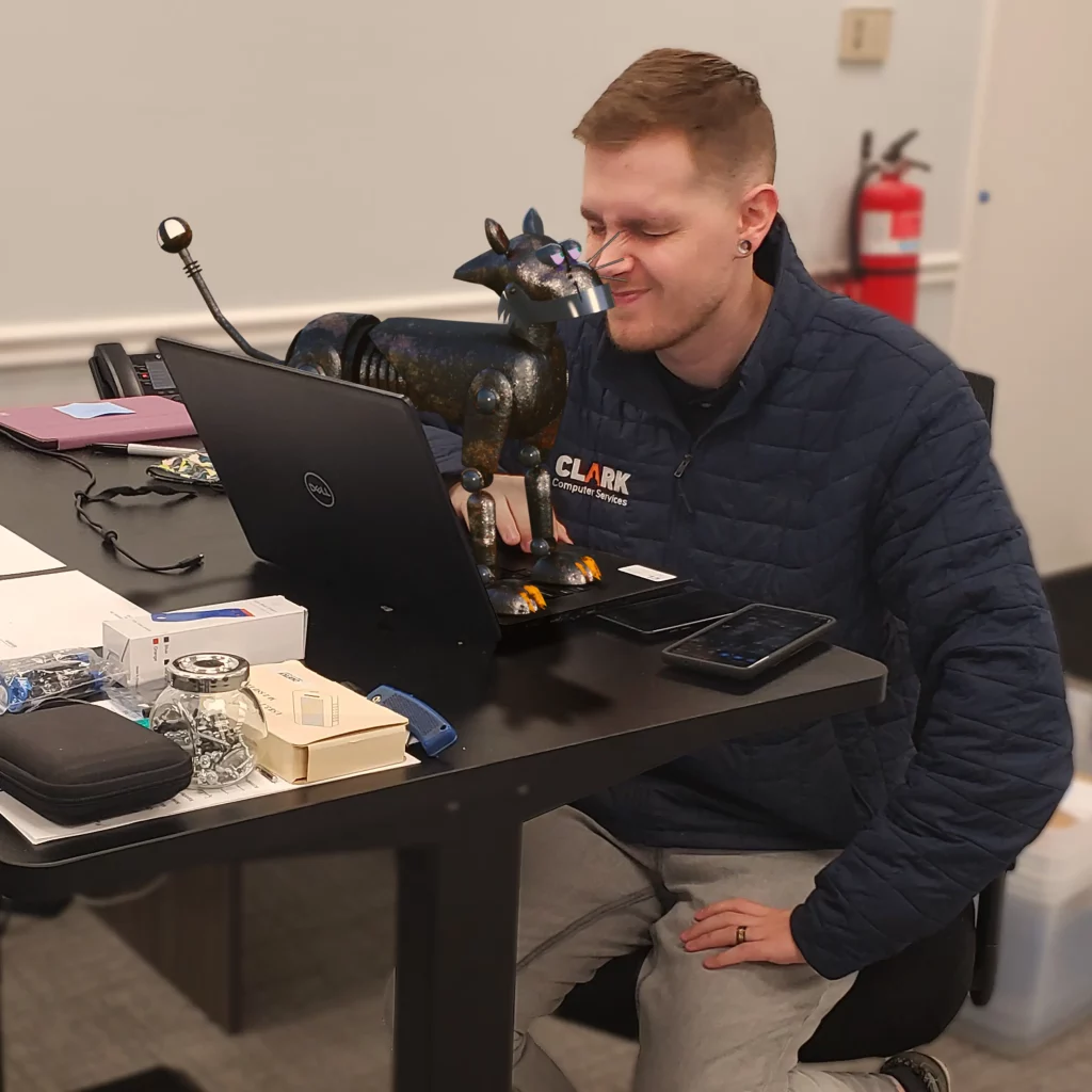 What is AI (Artificial Intelligence) | Sydney's Seminar | What is AI (Artificial Intelligence) | Sydney's Seminar | What is AI? Image of Caleb with a robot cat.