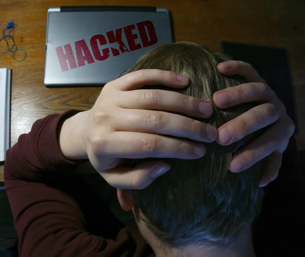 Cyber Attacks Are Personal | Chuck's Cyber Wall | Cyber Attacks Are Personal | Chuck's Cyber Wall | Chuck's Cyber Wall: Cyber Attacks are Personal person frustrated after being attacked.