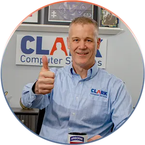 Our Team | Always Responsive, Professional, and Friendly | Our Team | Always Responsive, Professional, and Friendly | Our Team image of Darren Clark in his office giving a thumbs up.